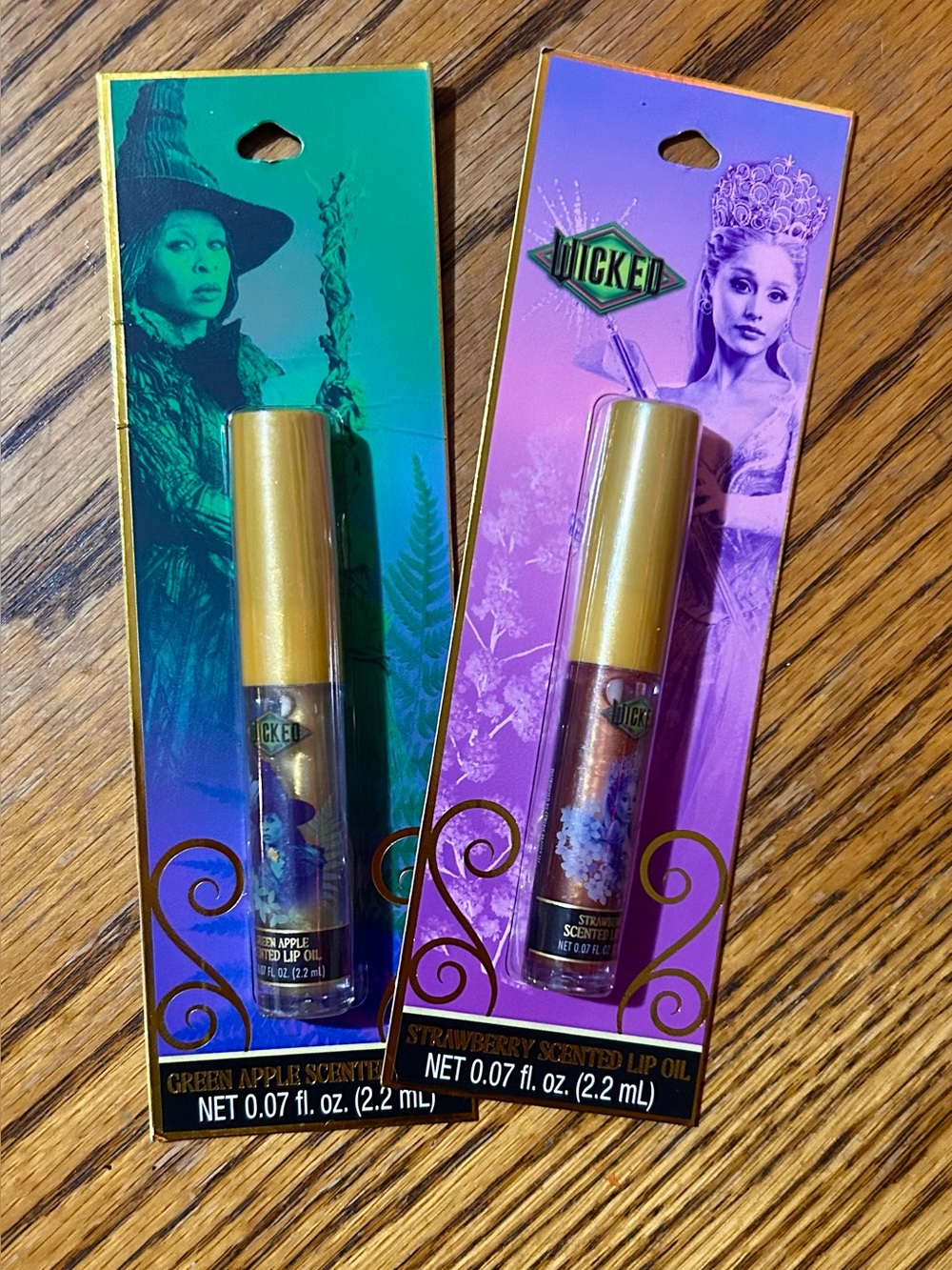 Wicked Set of 2 Lip Oils - Glinda and Elphaba - Brand New